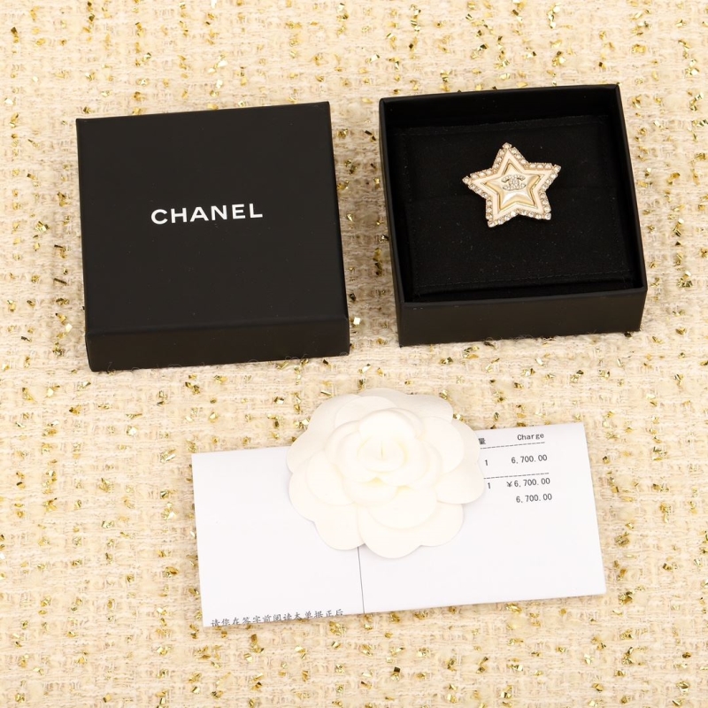 Ch*el brooches